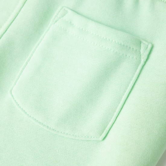 Vaikiškos sportinės kelnės, ryškiai žalios spalvos, 128 dydžio